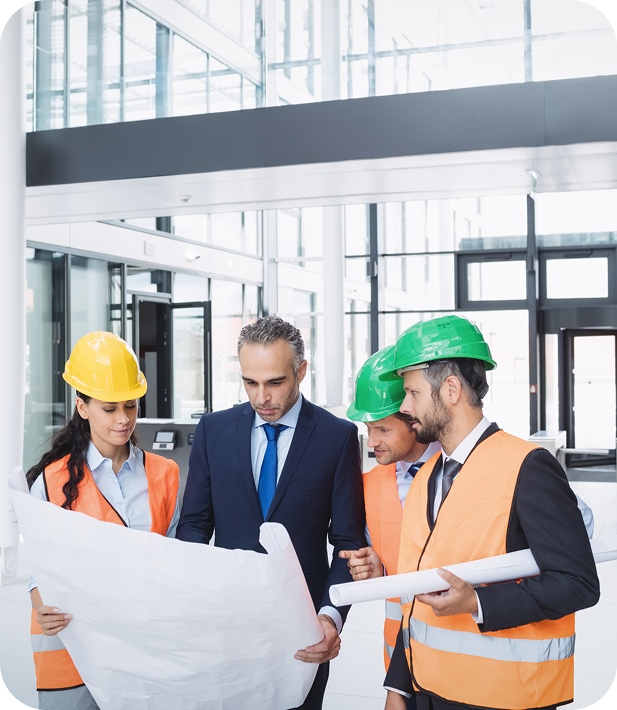 Engineers reviewing plans